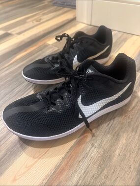 Nike Wonen’s Black and White Athletic Running Spikes size 8